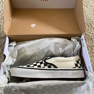 Brand new in box, never been used vans comfycush checkerboard men’s slip ons!